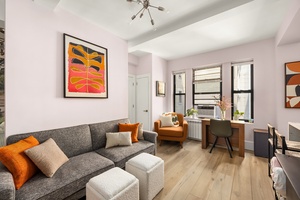 Perched on the 9th floor of 215 West 75th Street, this fully gut renovated alcove studio has been meticulously reimagined with modern finishes.