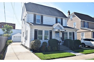 HERRICKS ! ! RARE FIND Don't Miss This Pristine 3 Bedroom 1 Full Bath Colonial Home On A Beautiful Tree Lined Street in the Highly Sought After Herricks School District ...