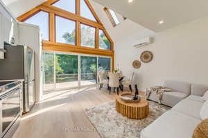 Stunning fully renovated home with 3 self contained legal units, each with it's own kitchen, laundry, entrance, and hydro meter.