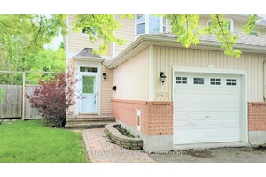 End unit townhouse with no rear neighbours, and irregular larger lot size with private backyard.