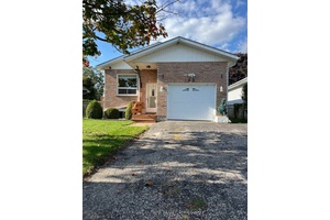 Lovely 3 bedroom, 2 bath bungalow nestled on a quiet cut de sac with minimal traffic.