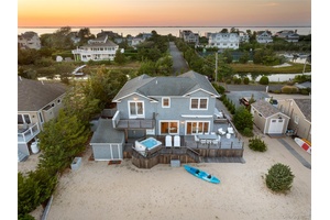 Set along the shoreline of the coveted Cold Spring Point Beach Community, this newly reimagined beach house with a private dock offers the perfect balance of Hamptons sophistication and laid ...