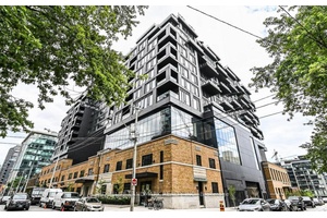 Luxurious And Functional Split two bedroom, two bathroom 793 SF soft loft in the award winning Waterworks Condos, located in the heart of dynamic King West.