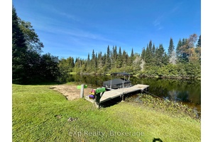 Escape to the serenity of the Magnetawan River with this private, turnkey 3 bedroom, 1.