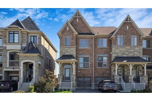 Situated in the highly desirable Vellore Village of Vaughan, this stunning executive end unit townhome at 160 Sunset Terrace is the epitome of luxury and function.