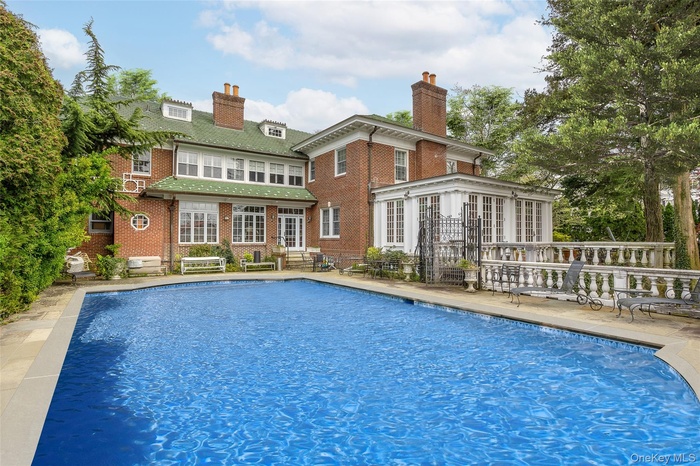Outdoor pool featuring a patio area