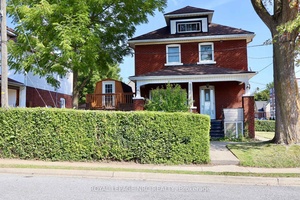 Welcome to this 2. 5 storey home that boast classic character and style featuring a leaded window in the upper staircase.