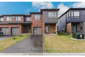 Corner Unit Townhouse, a bright and spacious end unit townhouse in the desirable Crown of Stonebridge community, just steps from the golf course.