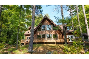 I am excited to share details about a remarkable property on Lake of Islands, offering unparalleled privacy and stunning natural beauty.
