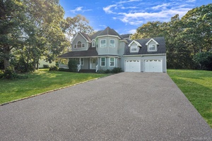 Spacious 4 bedroom, 2. 5 bath Colonial situated on a quiet cul de sac with.