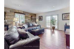 Nestled on a unique L shaped property in the friendly community of Musselman Lake, this home boasts two road frontages !