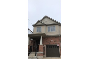 Beautifully luxury End Unit townhome in the sought after Wallaceton community !