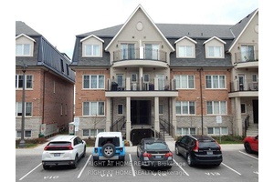 Discover the epitome of modern living in this stunningly upgraded stacked townhome, perfect for families working from home or those seeking an easy commute via QEW.