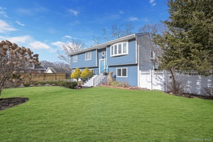 5 bedroom, 2 bath high ranch sitting on.