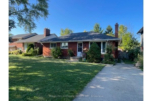Great All Brick Bungalow In South End Neighborhood.