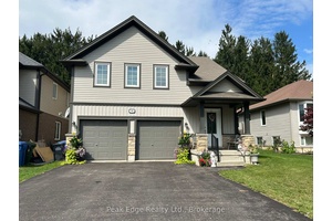 Discover the charm and functionality of this 3 bedroom, 2 bathroom home with open concept main floor which offers hardwood and dining area with walkout to 2 tiered deck and ...