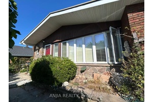 LOCATION, LOCATION. Newly renovated 2 spacious bedroom with Large Above Ground Window.