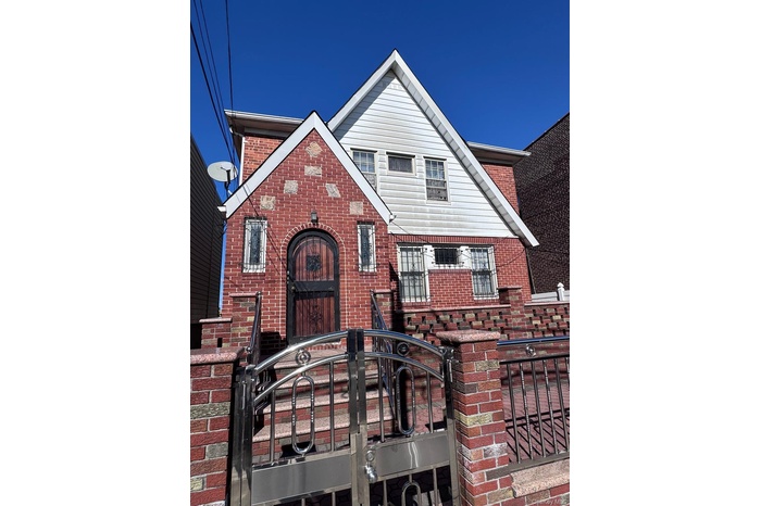 View of front of home with brick siding