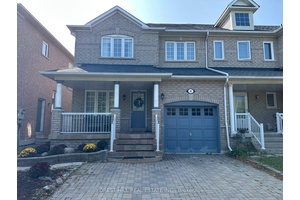 Beautiful end unit freehold townhouse located in a highly sought after community, just steps from the Mount Joy GO Station.