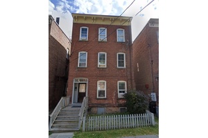 Enjoy the views of the Hudson River from this Townhouse Fixer Upper.
