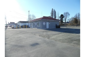 The commercial property for sale includes an 704 sq ft building that is being leased at 1, 200 month triple net on a 0.