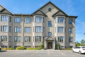 Lovely End Unit 2 Bedroom, 2 Bathroom Condo with 2 Parking Spots amp ; Pond View !
