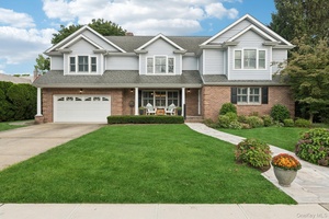 This beautiful 3756 sf, 5 Br, 3.