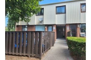 Welcome to 1100 Oxford Street, Unit 2 a beautifully maintained condo that perfectly blends comfort, convenience, and modern living with new flooring.