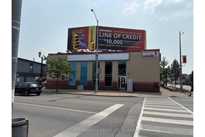 EXCELLENT PRIME CORNER PROPERTY LOCATED ON FERRY STEET AND MAIN STREET.
