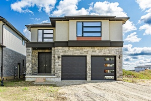 LEGAL DUPLEX Welcome to 1919 Evans Blvd, a stunning luxury home nestled in the highly desirable Summerside neighbourhood of South London.