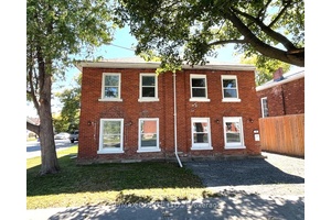 Impressive all brick duplex, fully renovated with two spacious side by side units.