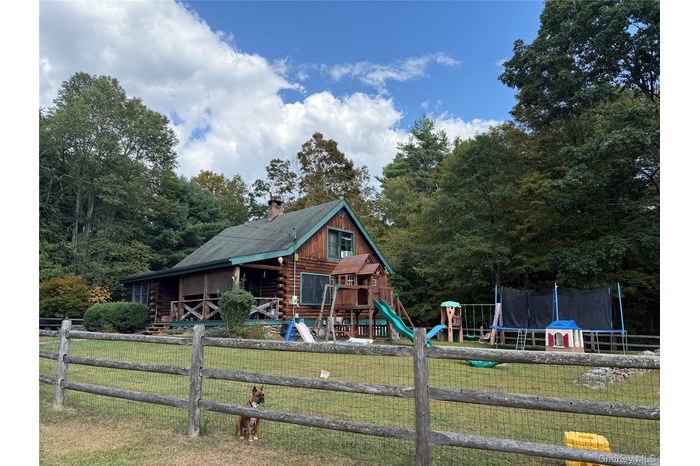 View of playground with a trampoline