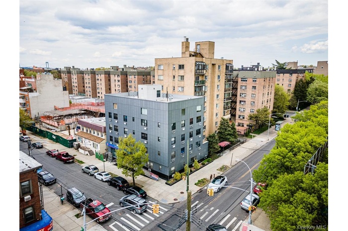 View of building exterior featuring a city view