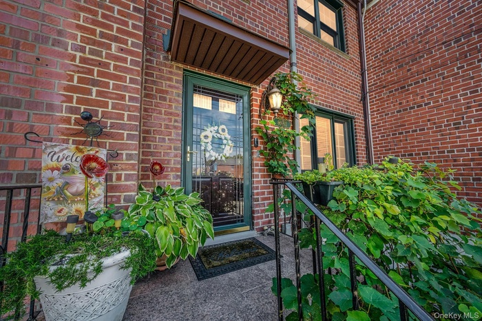 Property entrance with brick siding