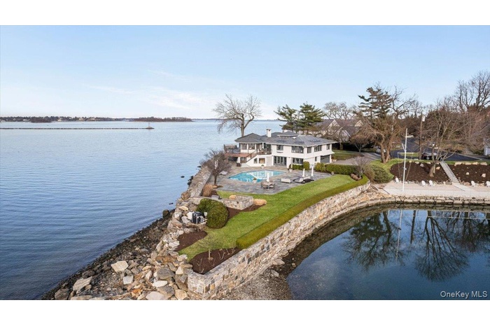 Captivating waterfront property positioned on the only peninsula on Manursing Island
