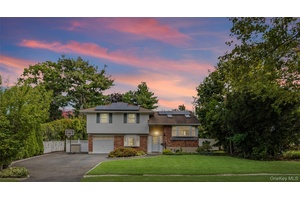 Beautiful updated Expanded 3 bedroom, 2 1 2 bath Split located in the Country Village section of Kings Park !