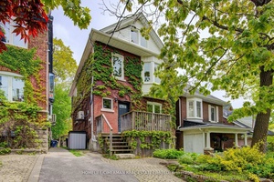Coveted Detached 3 Storey Home with Idyllic Garden Retreat in The Beaches.