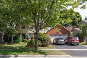 Welcome to this lovingly cared for four bedroom family home, nestled on a tree lined street inOakvilles desirable Ford community.