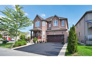Absolutely Stunning Detached Home with double door entrance and bonus double door entrance to the basement !