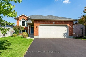 Welcoming to this charming, raised brick ranch is located in the heart of Southside, just a short stroll from the serene shores of Lake Margaret.