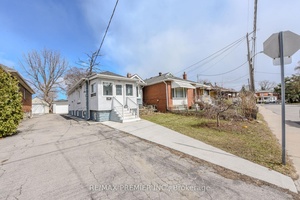 Bright amp ; Spacious 3 Bedroom Bungalow with 4 Bedroom Basement Apartment on a Huge 30Ft X 230Ft Lot Perfect for Large Families or Rental Income !