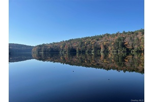 YES ! ! ! You just discovered a rare opportunity to own a breathtaking wooded lot nestled on the tranquil shores of the Rio Reservoir.