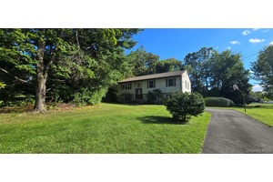 Charming Raised Ranch offering 3 4 bedrooms and 1.