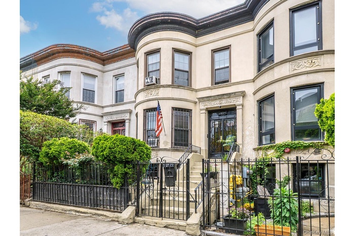View of property with a fenced front yard