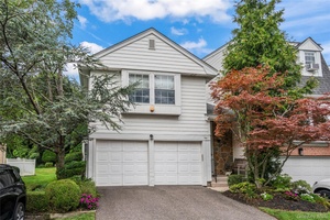 Welcome to this Exquisite End Unit Vale Model in the Prestigious Guard Gated Community of Hidden Ridge !