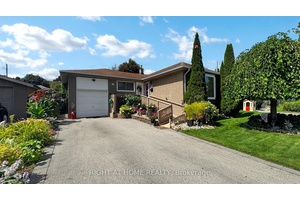 Welcome to this detached raised bungalow with Award Winning Gardens.