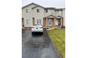 Prime Location ! This freehold townhome is conveniently close to the highway, offering easy access to all your destinations.