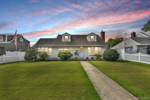 Welcome to 136 Maple Street, Massapequa.