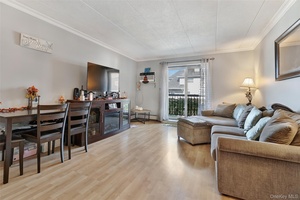Fresh on the Market ! Welcome to your seaside retreat in beautiful Belle Harbor.