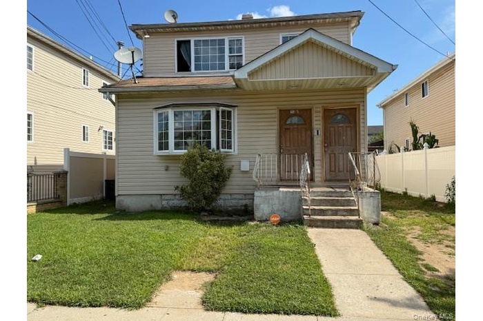 View of front of house featuring covered porch